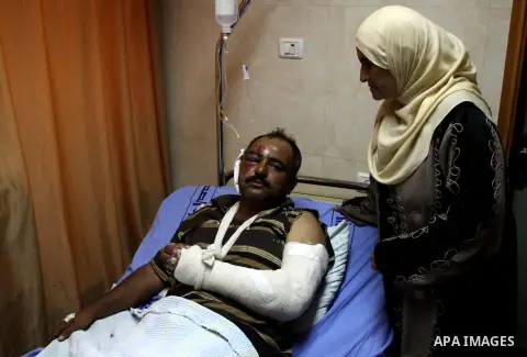A palestinian Akram Bani Odeh "35" in Rafidia hospital, after he was attacked by Israeli settlers attack Palestinian farmers in the West Bank city of Nablus, on Sep. 16, 2012. Photo by Nedal Eshtayah