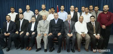 Secretary General of the Palestinian Cabinet in Gaza Strip, Abdel-Salam Siam receives the career duties in Gaza city on Sep. 16, 2012. Photo by Ahmed Shaat
