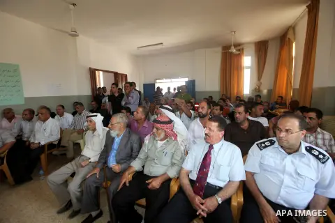 Palestinians Prime Minister Salam Fayyad (not seen) during his visit to Tubas and the northern Jordan Valley in the West Bank on Sept. 16, 2012. Photo by Mustafa Abu Dayeh