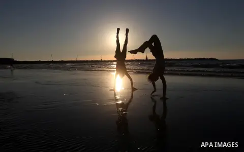 Palestinian youths play at the beach of Gaza city, Sept 17, 2012. Photo by Majdi Fathi