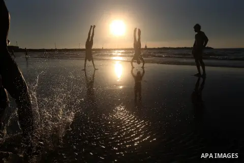 Palestinian youths play at the beach of Gaza city, Sept 17, 2012. Photo by Majdi Fathi