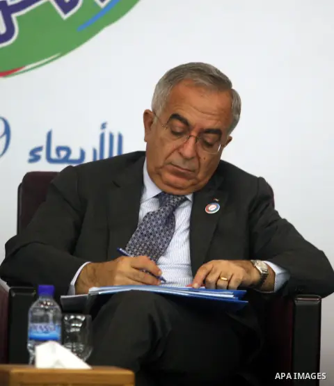 Palestinian Prime Minister Salam Fayyad attends the ceremony of launch of "Distinction Program " in the West Bank city of Ramallah September 19, 2012. Photo by Issam Rimawi