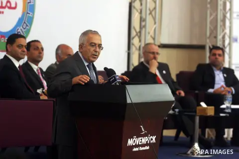 Palestinian Prime Minister Salam Fayyad speaks during the ceremony of launch of "Distinction Program " in the West Bank city of Ramallah September 19, 2012. Photo by Issam Rimawi