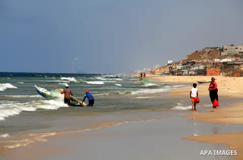 Palestinian fishermen prepare their boat to sailing at the sea front in Deir al-Balah Palestinian refugee camp, central of Gaza Strip, on September 19, 2012. Photo by Majdi Fathi