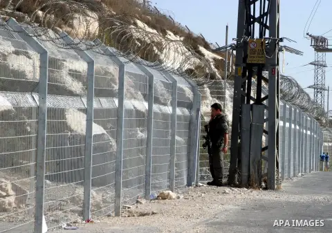 Israeli border officers stand guard during sealing off the Ras Khamis Checkpoint northen jerusalem on Sept. 20, 2012. The Israeli Ministry of Defence has announced its plans to seal off one of two checkpoints through whi...