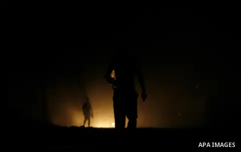 Palestinians walk in the streets of in Rafah in the southern Gaza Strip on Sep. 21, 2012. Gaza Strip is experiencing a major electricity crisis because of a shortage of fuel for the power plant. Photo by Eyad Al Baba
