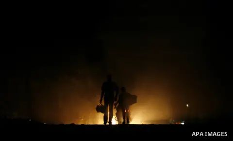 Palestinians walk in the streets of in Rafah in the southern Gaza Strip on Sep. 21, 2012. Gaza Strip is experiencing a major electricity crisis because of a shortage of fuel for the power plant. Photo by Eyad Al Baba
