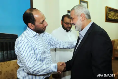 Palestinian Prime Minister in Gaza Ismail Haniyeh meets with "Convoy to fulfill 3" in his office in Gaza City, on Sep. 22, 2012. Photo by Ahmed Shaat