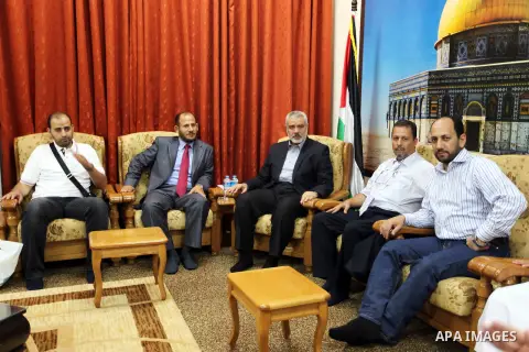 Palestinian Prime Minister in Gaza Ismail Haniyeh meets with "Convoy to fulfill 3" in his office in Gaza City, on Sep. 22, 2012. Photo by Ahmed Shaat