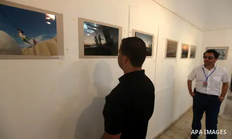 Palestinians participate in the photography gallery to calling for an end to the division between Hamas and Fatah in Gaza City, Saturday, Sep. 22, 2012. Photo by Majdi Fathi