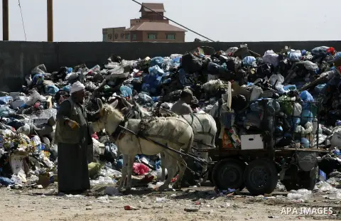 Palestinians collect rubbish to production compost in station in Rafah in the southern Gaza Strip, on Sep. 23, 2012 Some Palestinians, driven by poverty exacerbated by the Israeli blockade and lack of employment opportun...