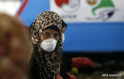 Palestinian women sort solid waste for production compost in station in Rafah in the southern Gaza Strip, on Sep. 23, 2012 Some Palestinians, driven by poverty exacerbated by the Israeli blockade and lack of employment o...