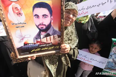 A Palestinian woman takes part in a protest in Gaza City calling for the release of Palestinian prisoners from Israeli jails September 24, 2012. Photo by Majdi Fathi