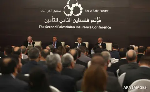 Palestinian Prime Minister, Salam Fayyad, speaks during of the second Conference on Palestine insurance companies, in the West Bank city of Ramallah, on Sep. 24, 2012. Photo by Mustafa Abu Dayeh