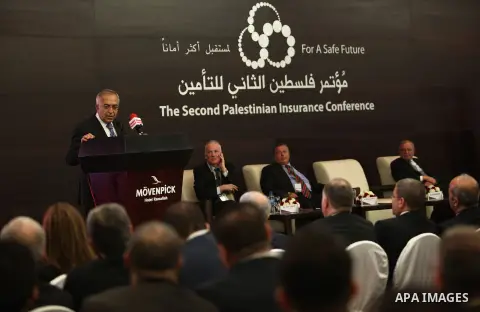 Palestinian Prime Minister, Salam Fayyad, speaks during of the second Conference on Palestine insurance companies, in the West Bank city of Ramallah, on Sep. 24, 2012. Photo by Mustafa Abu Dayeh