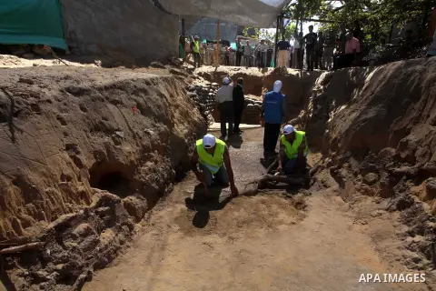 Palestinian employees work at the new archaeological site in Beit Lahia northern Gaza Strip on September 24, 2012. The French government is financing the restoration of the archaeological site which dates back to 329 AD...