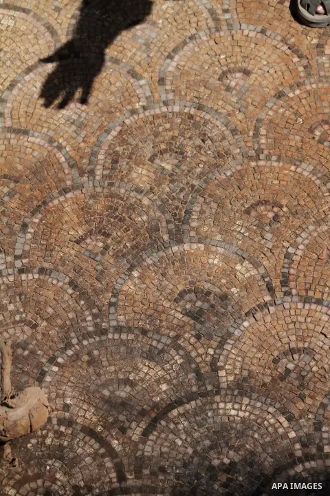 Palestinian employees work at the new archaeological site in Beit Lahia northern Gaza Strip on September 24, 2012. The French government is financing the restoration of the archaeological site which dates back to 329 AD...