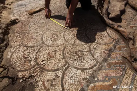Palestinian employees work at the new archaeological site in Beit Lahia northern Gaza Strip on September 24, 2012. The French government is financing the restoration of the archaeological site which dates back to 329 AD...