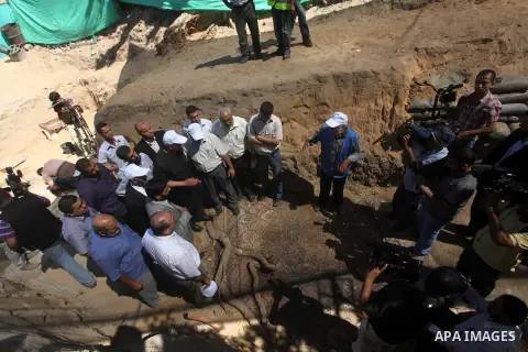 Palestinian employees work at the new archaeological site in Beit Lahia northern Gaza Strip on September 24, 2012. The French government is financing the restoration of the archaeological site which dates back to 329 AD...
