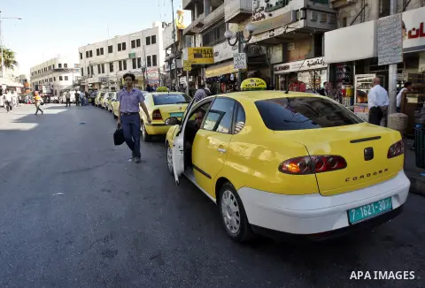 Palestinian taxi drivers park their cars during a protest against rising fuel prices and the high cost of living, in the West Bank city of Nablus, Sept. 24, 2012. Photo by Nedal Eshtayah