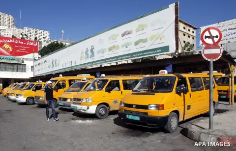 Palestinian taxi drivers park their cars during a protest against rising fuel prices and the high cost of living, in the West Bank city of Nablus, Sept. 24, 2012. Photo by Nedal Eshtayah