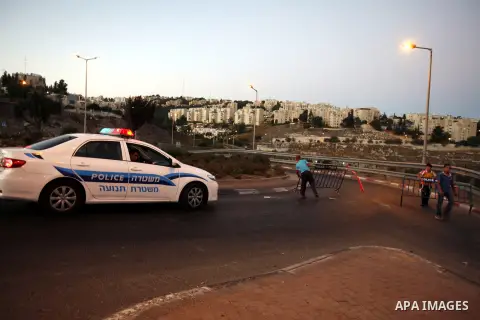 Palestinian children ride their bicycles during closing the roads between the Israeli settlements and the Arab neighborhoods by the Israeli border police in Jerusalem's old city, Sept. 25, 2012. Closes early for Yom Kipp...