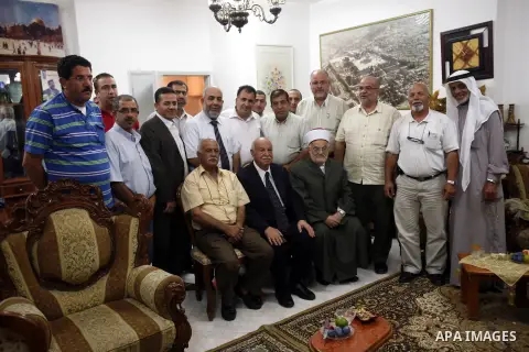 A delegation from the committee of "al-Morabeetin" visits Sheikh Najeh Bakirat after prevented from entering the al-Aqsa Mosque by Israeli government, in Jerusalem, on September 25, 2012.. Photo by Mahfouz Abu Turk