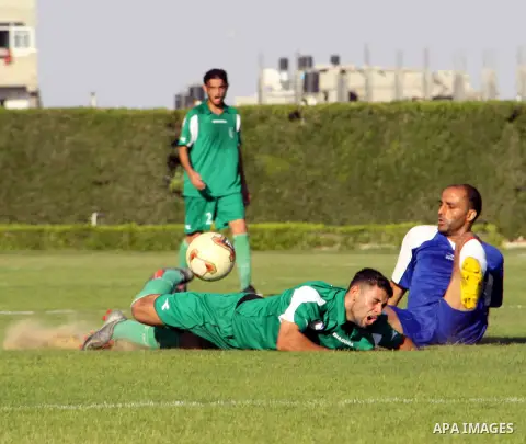 The Palestinian team of al-Shatie and the team of al-Shijaia during the premier league soccer match in Gaza city on 23 September 2012. Photo by Alaa Shamaly