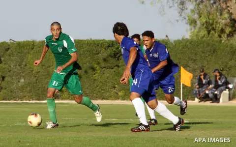 The Palestinian team of al-Shatie and the team of al-Shijaia during the premier league soccer match in Gaza city on 23 September 2012. Photo by Alaa Shamaly
