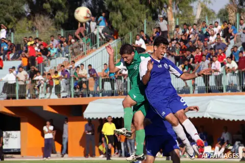 The Palestinian team of al-Shatie and the team of al-Shijaia during the premier league soccer match in Gaza city on 23 September 2012. Photo by Alaa Shamaly