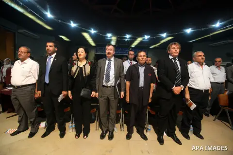 Palestinians attend the opining ceremony of Palestinian Model United Nations (PALMUN) in Gaza city on 27 September 2012 that is organized by the Migratory Letters campaign youth Group along with Gaza Culture and Developm...
