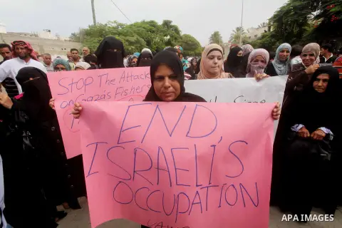 Palestinian women take part in a protest against what they say is frequent attacks on fishermen by the Israeli naval forces, in Gaza City September 30, 2012. Israel confines fishermen within a three-mile fishing zone in...