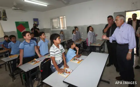 Palestinian Prime Minister Salam Fayyad visits ''al-Auja'' school in the occupied West Bank city of Jericho on September 30, 2012. Photo by Mustafa Abu Dayeh