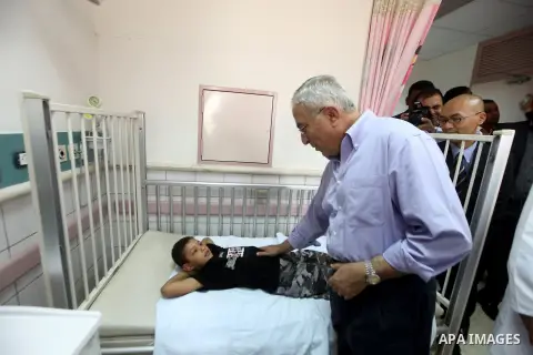 Palestinian Prime Minister Salam Fayyad visits the new hospital in the occupied West Bank city of Jericho on September 30, 2012. Photo by Mustafa Abu Dayeh