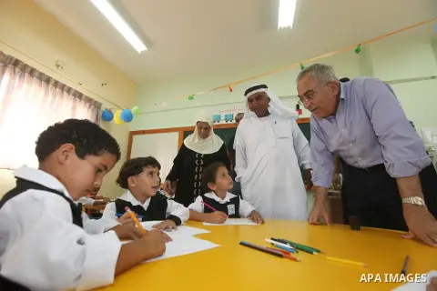 Palestinian Prime Minister Salam Fayyad visits "al-Mustqabal" Kindergarten in Ein al-Sultan refugee camp in the occupied West Bank city of Jericho on September 30, 2012. Photo by Mustafa Abu Dayeh