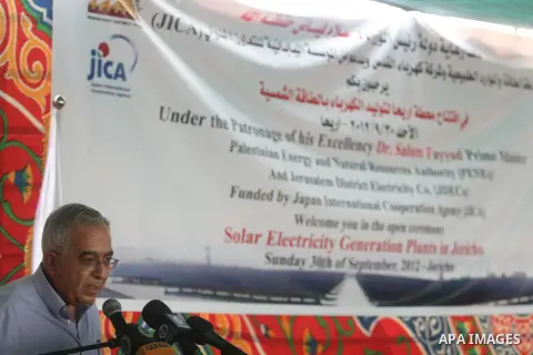 Palestinian Prime Minister Salam Fayyad speaks during a visit to the solar power station in the West Bank city of Jericho on September 30, 2012. Photo by Issam Rimawi