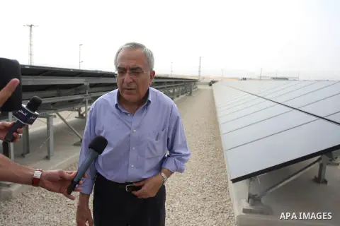 Palestinian Prime Minister Salam Fayyad speaks to the press during a visit to the solar power station in the West Bank city of Jericho on September 30, 2012. Photo by Issam Rimawi