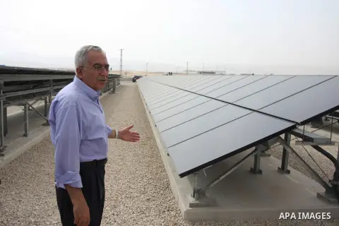 Palestinian Prime Minister Salam Fayyad visits the solar power station in the West Bank city of Jericho on September 30, 2012. Photo by Issam Rimawi