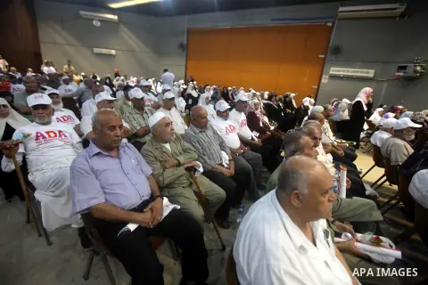Palestinians attend the ceremony of The International Day of Older Persons in Gaza city on October 1, 2012. The Day of Older Persons is celebrated by raising awareness about issues affecting the elderly, such as senescen...