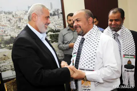 Palestinian Prime Minister in Gaza Strip, Ismail Haniyeh, receives convoy of "Miles of Smiles 16" in his office in Gaza City on October 1, 2012. Photo by Mohammed Ostaz