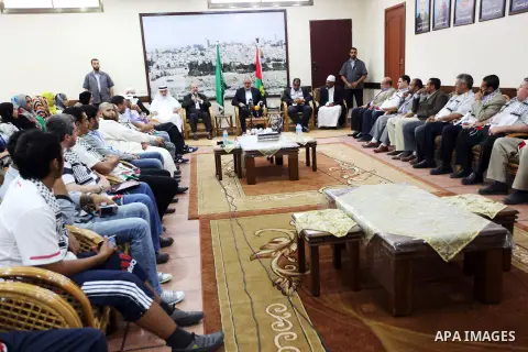 Palestinian Prime Minister in Gaza Strip, Ismail Haniyeh, receives convoy of "Miles of Smiles 16" in his office in Gaza City on October 1, 2012. Photo by Mohammed Ostaz