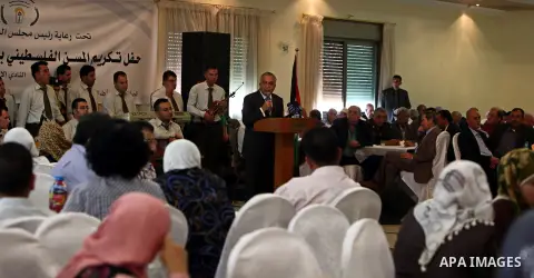 Palestinian Prime Minister Salam Fayyad speaks during the the ceremony of The International Day of Older Persons in the West Bank city of Ramallah on October 1, 2012. The Day of Older Persons is celebrated by raising awa...