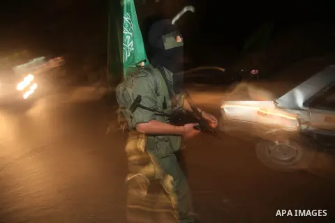 A Palestinian militant of Ezzedine al-Qassam Brigade, the military wing of the Palestinian Islamist movement Hamas which rules Gaza, participates in an anti-Israel military show in Gaza City October 1, 2012. Photo by Maj...