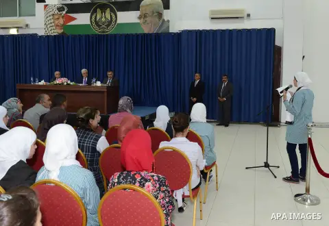 Palestinian President Mahmoud Abbas (Abu Mazen) meets with featured students from Jerusalem, in the West Bank city of Ramallah on October 1, 2012. Photo by Muhammed Ateeq