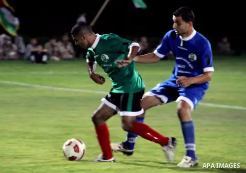 Mahmud Sarsak, Palestinian football player, plays with the team of al-Shijaia and Rafah Youth Club, in Yarmouk Stadium in Gaza city, on Oct. 02, 2012. Photo by Alaa Shamaly