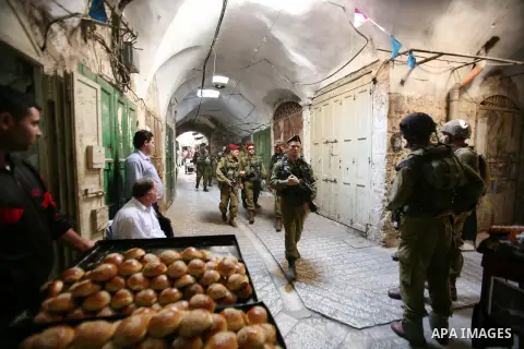 Jews shop at the market during the preparation for the celebration of Sukkot, the Feast of the Tabernacles, in in the West bank city of Hebron on Oct. 03, 2012. Temple before it was destroyed, perform a blessing ceremony...