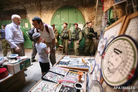 Jews shop at the market during the preparation for the celebration of Sukkot, the Feast of the Tabernacles, in in the West bank city of Hebron on Oct. 03, 2012. Temple before it was destroyed, perform a blessing ceremony...