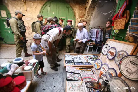 Jews shop at the market during the preparation for the celebration of Sukkot, the Feast of the Tabernacles, in in the West bank city of Hebron on Oct. 03, 2012. Temple before it was destroyed, perform a blessing ceremony...