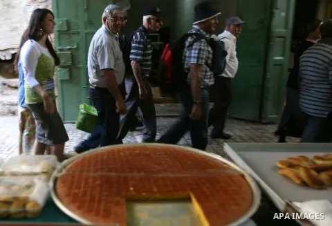 Jews shop at the market during the preparation for the celebration of Sukkot, the Feast of the Tabernacles, in in the West bank city of Hebron on Oct. 03, 2012. Temple before it was destroyed, perform a blessing ceremony...
