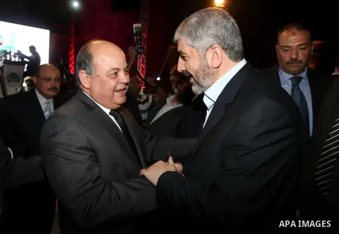 Palestinian Hamas leader Khaled Meshaal, shaking hands Minister of Culture Dr. Mohamed Saber Arab during ceremony of Al Fateh Al Salahi in Salah Al dein Citadel under the auspices of the Egyptian Ministry of Culture, in...